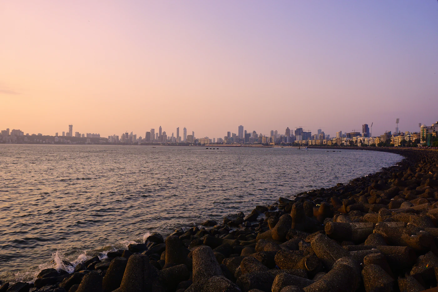 Mumbai skyline representing Mukesh Ambani 1 minute income property, houses and business wealth